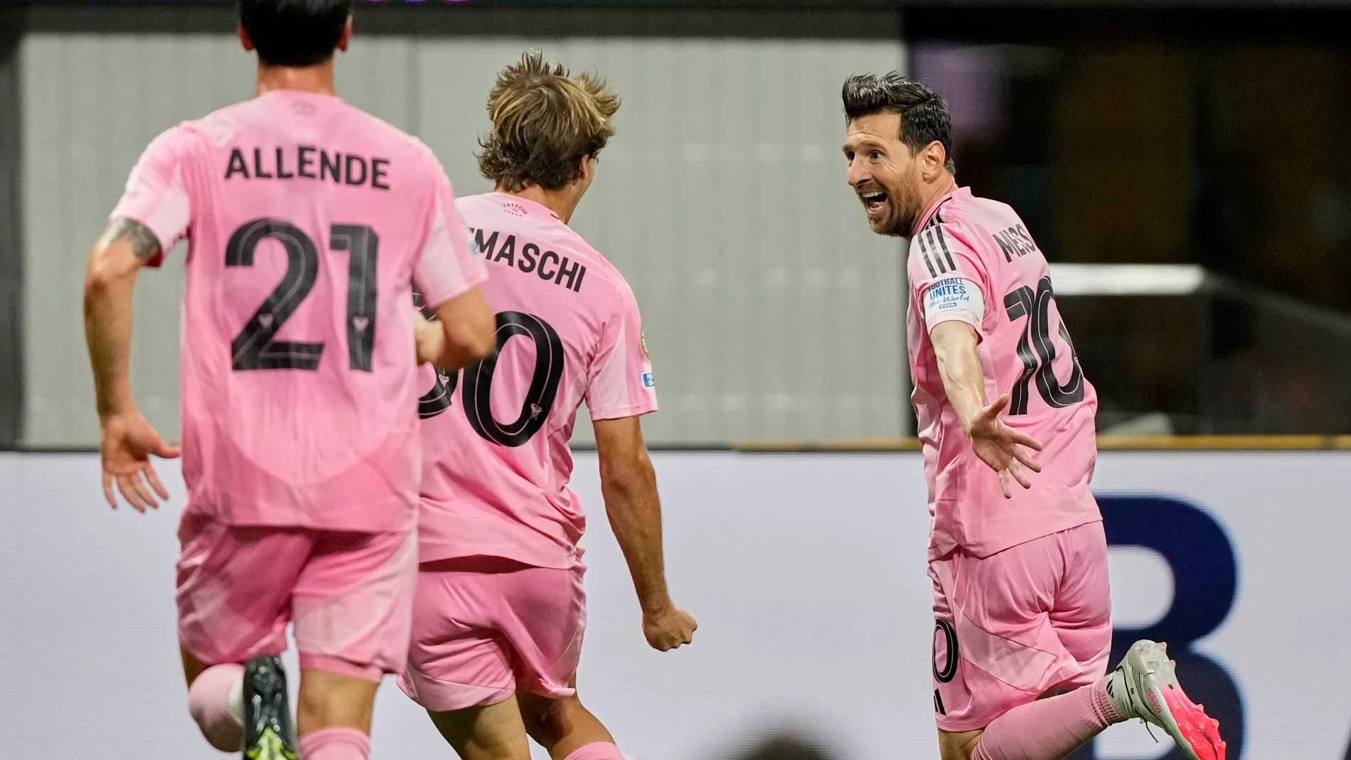 Inter Miami's Lionel Messi, right, celebrates after scoring his side's second goal during the Club World Cup group A soccer match between Inter Miami and FC Porto in Atlanta, Thursday, June 19, 2025. (AP Photo/Brynn Anderson)