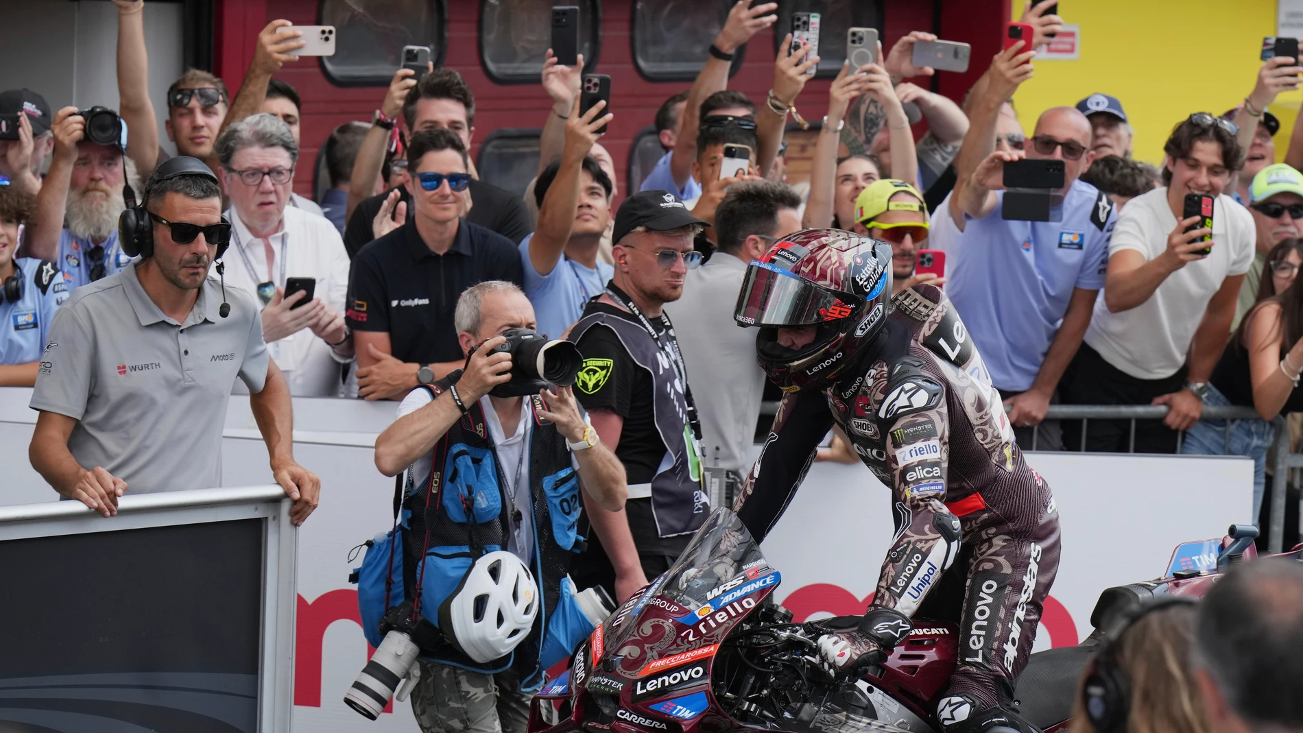 Spain's rider Marc Marquez of the Ducati Lenovo Team celebrates his victory after the MotoGP race of the Grand Prix of Italy at the Mugello circuit in Scarperia, Italy, Sunday, June 22, 2025. (AP Photo/Antonio Calanni)