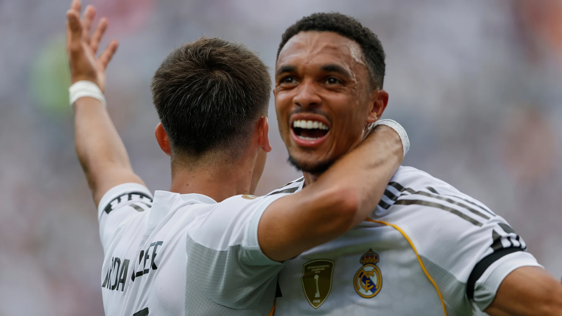 Real Madrid's Arda Guler, left, and Real Madrid's Trent Alexander-Arnold celebrate after a goal during the Club World Cup Group H soccer match between Real Madrid and CF Pachuca in Charlotte, N.C., Sunday, June 22, 2025. (AP Photo/Nell Redmond)