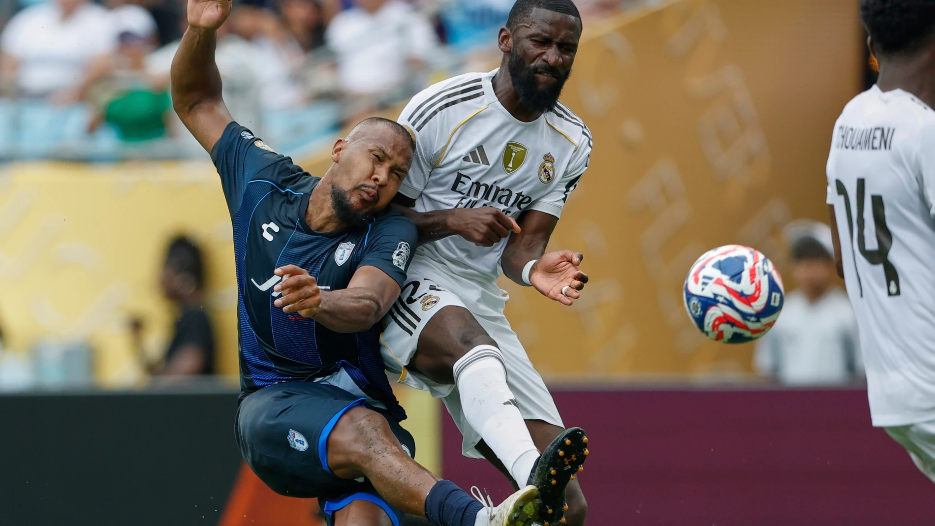 Pachuca's Salomon Rondon shoots by Real Madrid's Antonio Rudiger during the Club World Cup Group H soccer match between Real Madrid and CF Pachuca in Charlotte, N.C., Sunday, June 22, 2025. (AP Photo/Nell Redmond)
