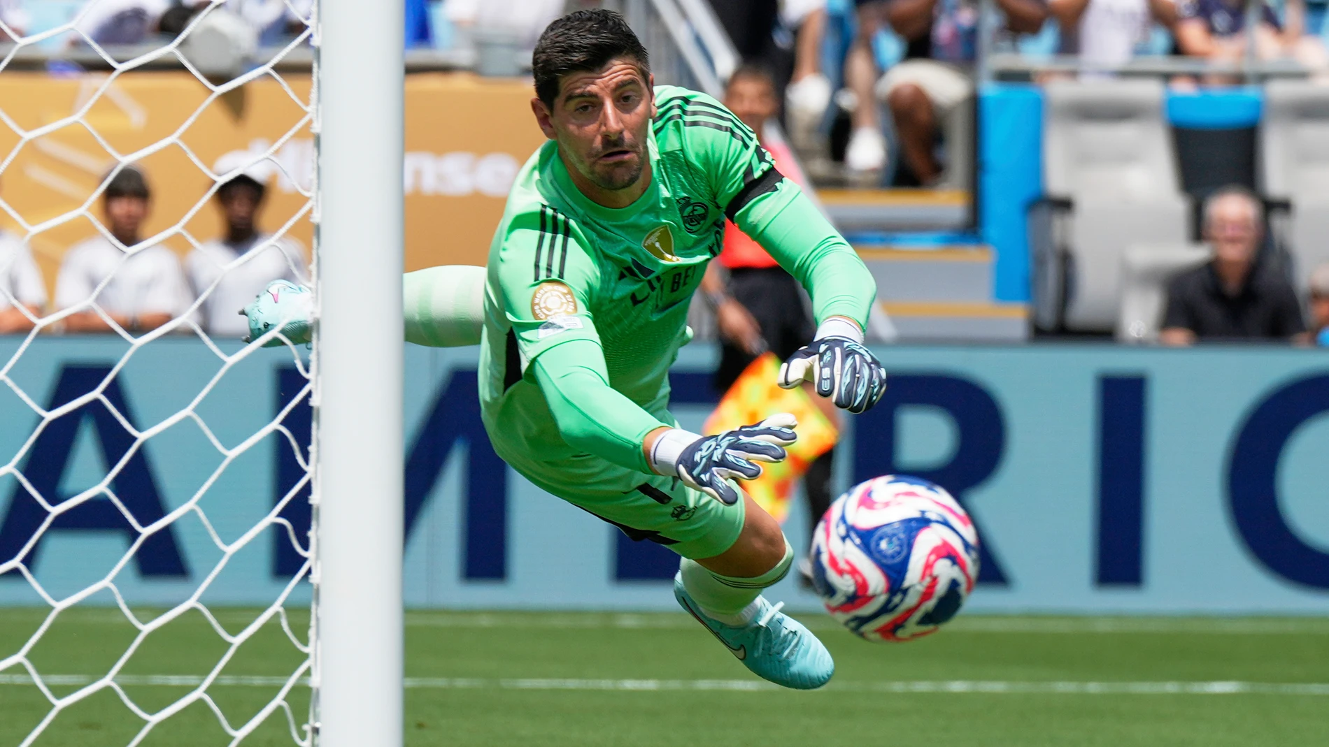 Real Madrid's Thibaut Courtois eyes the ball during the Club World Cup Group H soccer match between Real Madrid and CF Pachuca in Charlotte, N.C., Sunday, June 22, 2025. (AP Photo/Chris Carlson)