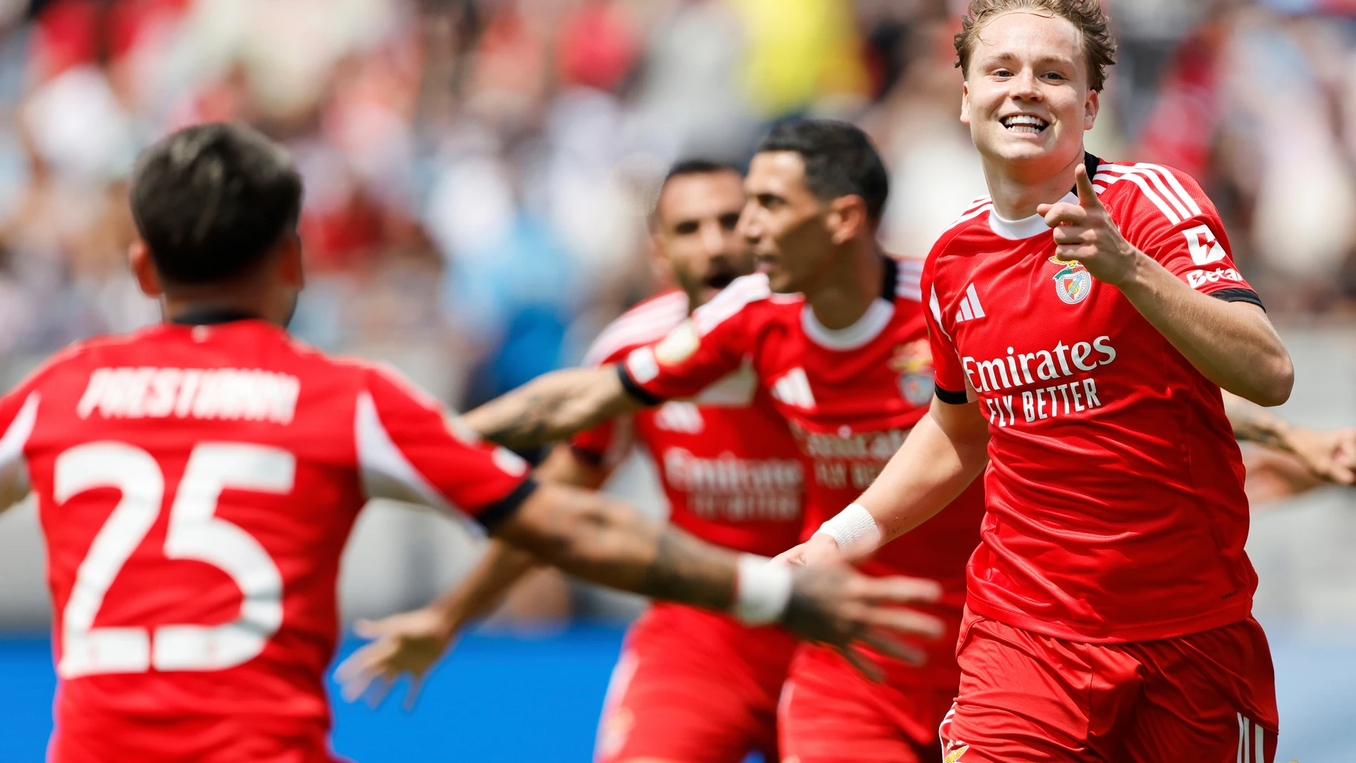 Benfica's Andreas Schjelderup and Gianluca Prestianni celebrate after scoring during the Club World Cup Group C soccer match between Benfica and Bayern Munich in Charlotte, N.C., Tuesday, June 24, 2025. (AP Photo/Nell Redmond)