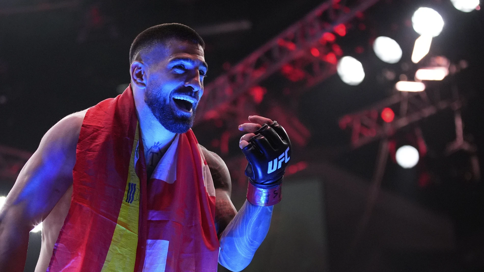 Ilia Topuria celebrates after defeating Charles Oliveira in a lightweight title fight at UFC 317, Saturday, June 28, 2025, in Las Vegas.