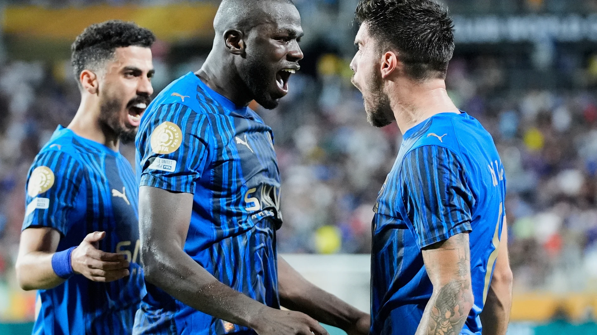 Al Hilal's Kalidou Koulibaly, centre, celebrates with teammates after scoring his team's third goal during the Club World Cup round of 16 soccer match between Manchester City and Al Hilal in Orlando, Fla., Monday, June 30, 2025. (AP Photo/John Raoux)