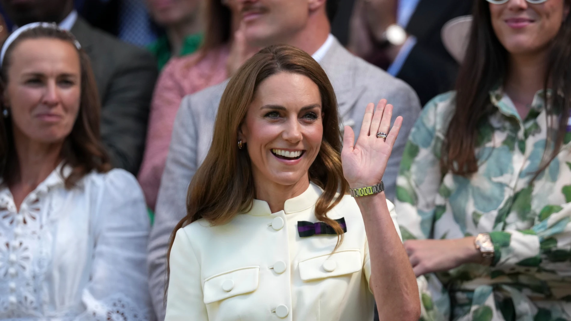Britain's Kate, Princess of Wales waves from the Royal Box on Centre Court ahead of the women's singles final at the Wimbledon Tennis Championships in London, Saturday, July 12, 2025. (AP Photo/Dave Shopland)