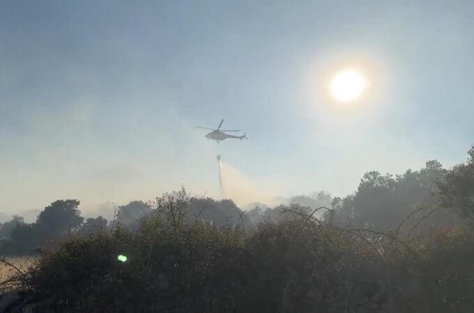 Sucesos.- Estabilizado el incendio forestal en Zarzalejo (Madrid), que baja a situación operativa 0