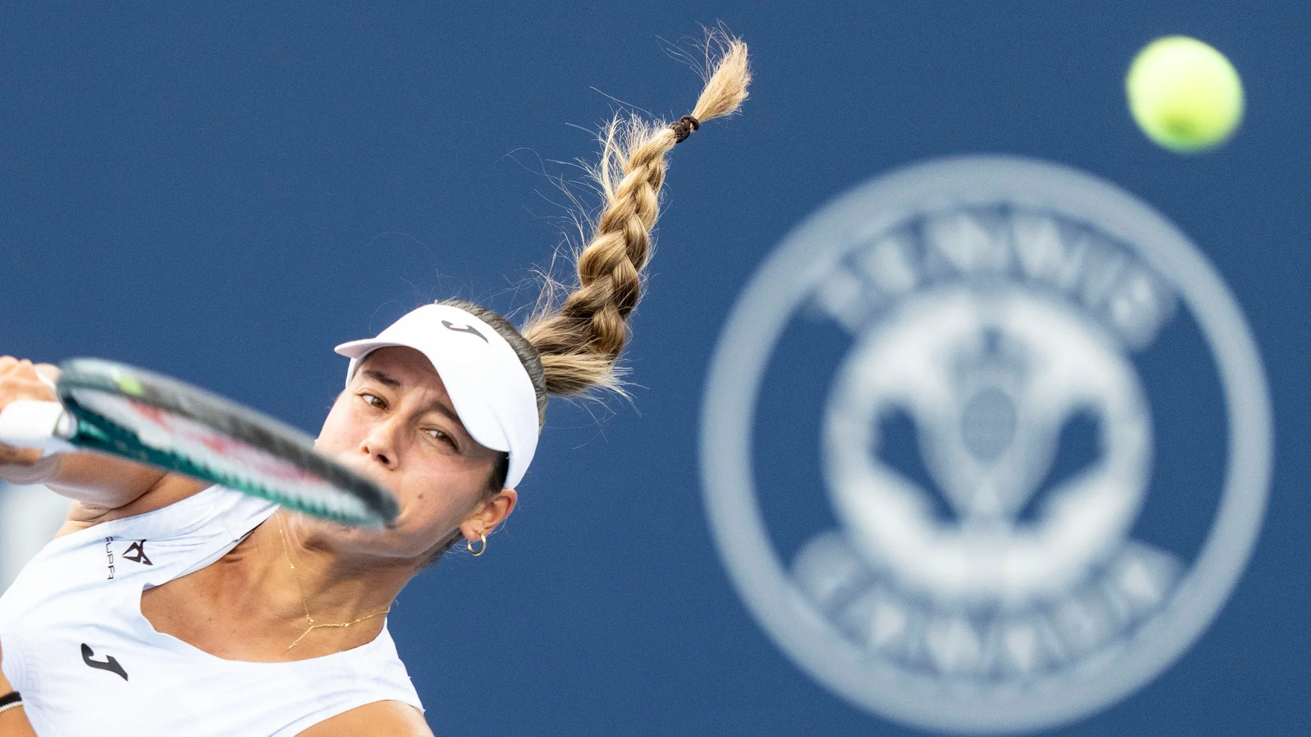 Jessica Bouzas Maneiro, of Spain, hits a return to Aoi Ito, of Japan, during third-round match action at the National Bank Open women's tennis tournament in Montreal, Thursday, July 31, 2025. (Christinne Muschi/The Canadian Press via AP)