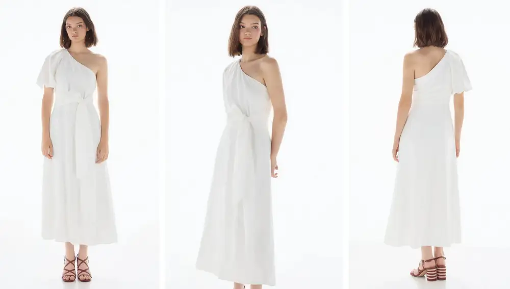 Vestido blanco asimétrico con manga abullonada y lazada (59€)