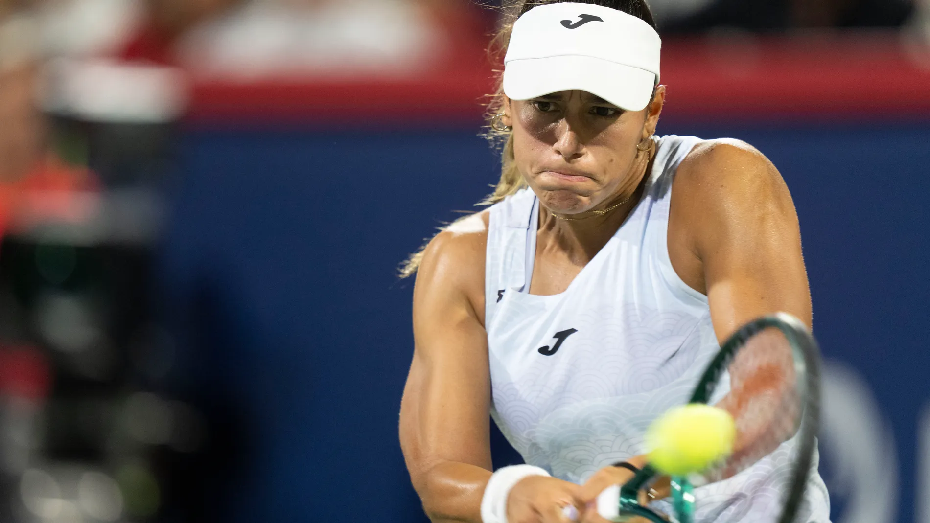 Jessica Bouzas Maneiro, of Spain, hits a return to Victoria Mboko, of Canada, during quarterfinal action at the National Bank Open women's tennis tournament in Montreal, Monday, Aug. 4, 2025. (Christinne Muschi/The Canadian Press via AP)