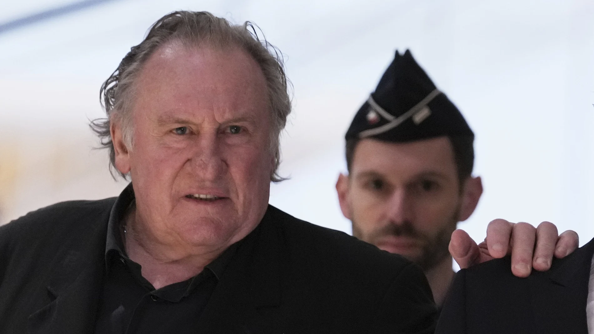 Actor Gerard Depardieu arrives to face trial for the alleged sexual assaults of two women on a film set in 2021,