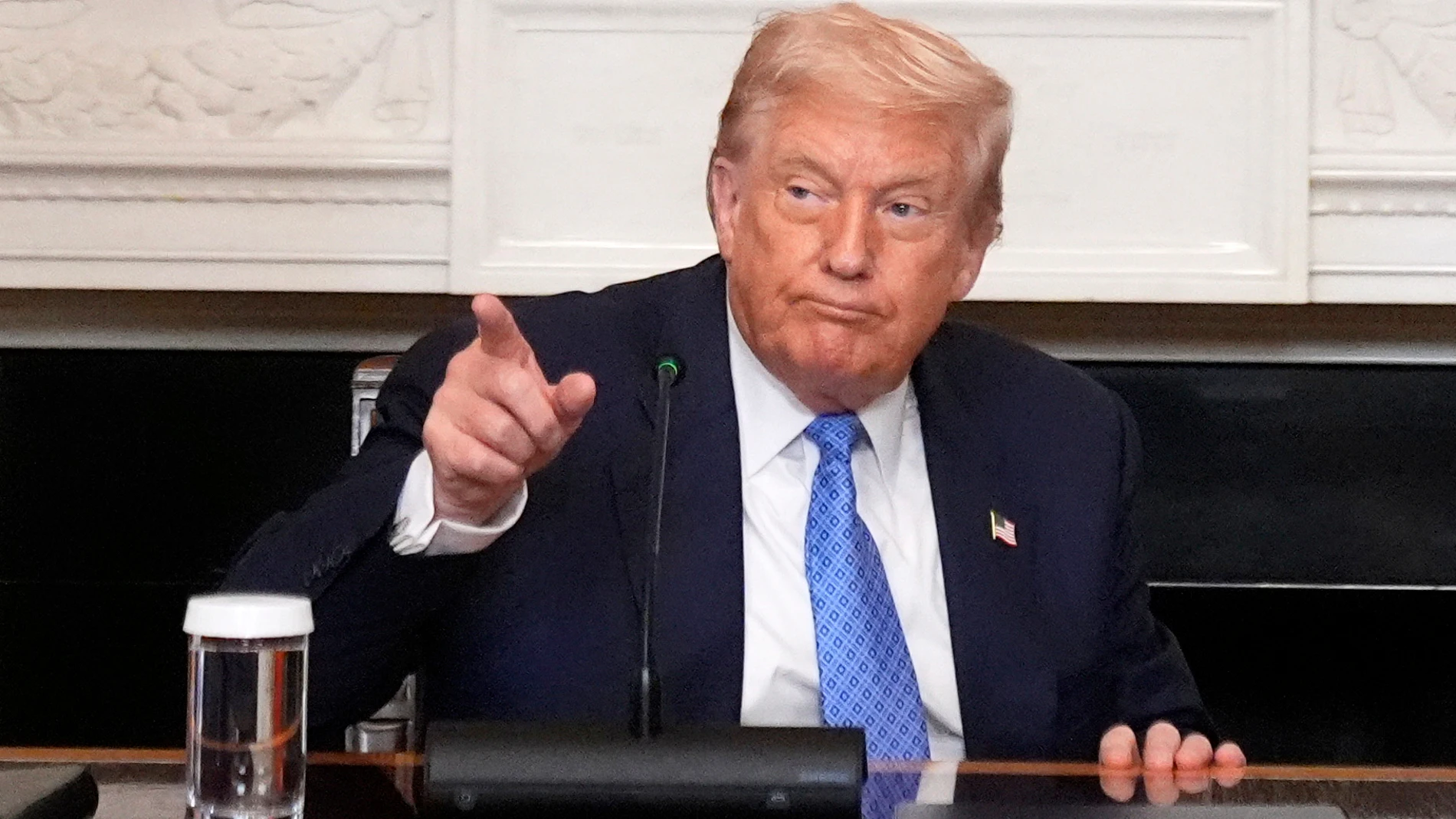 President Donald Trump gestures during a trilateral signing ceremony with Armenian Prime Minister Nikol Pashinyan and Azerbaijan President Ilham Aliyev in the State Dining Room of the White House, Friday, Aug. 8, 2025, in Washington. (AP Photo/Mark Schiefelbein)