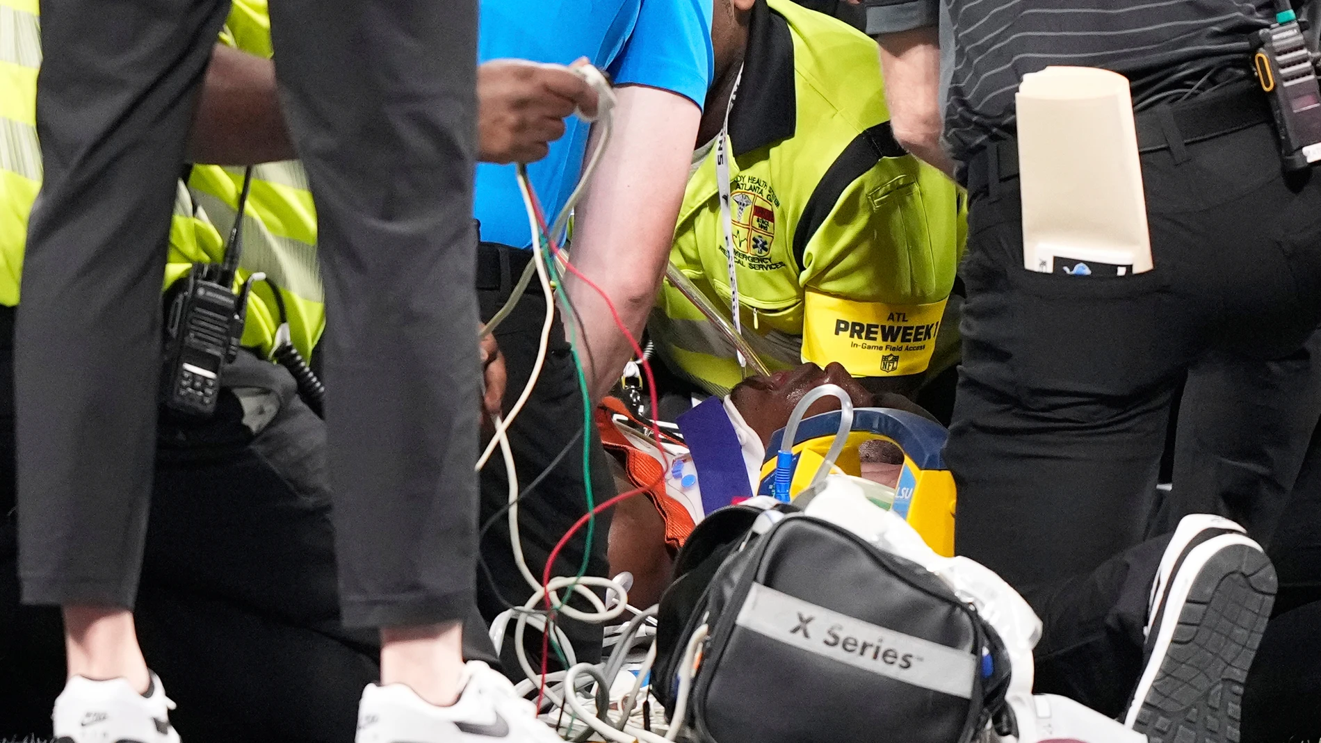 Medical personnel aid Detroit Lions safety Morice Norris (26) after he was injured against the Atlanta Falcons during the second half of an NFL preseason football game Friday, Aug. 8, 2025, in Atlanta. (AP Photo/Brynn Anderson)
