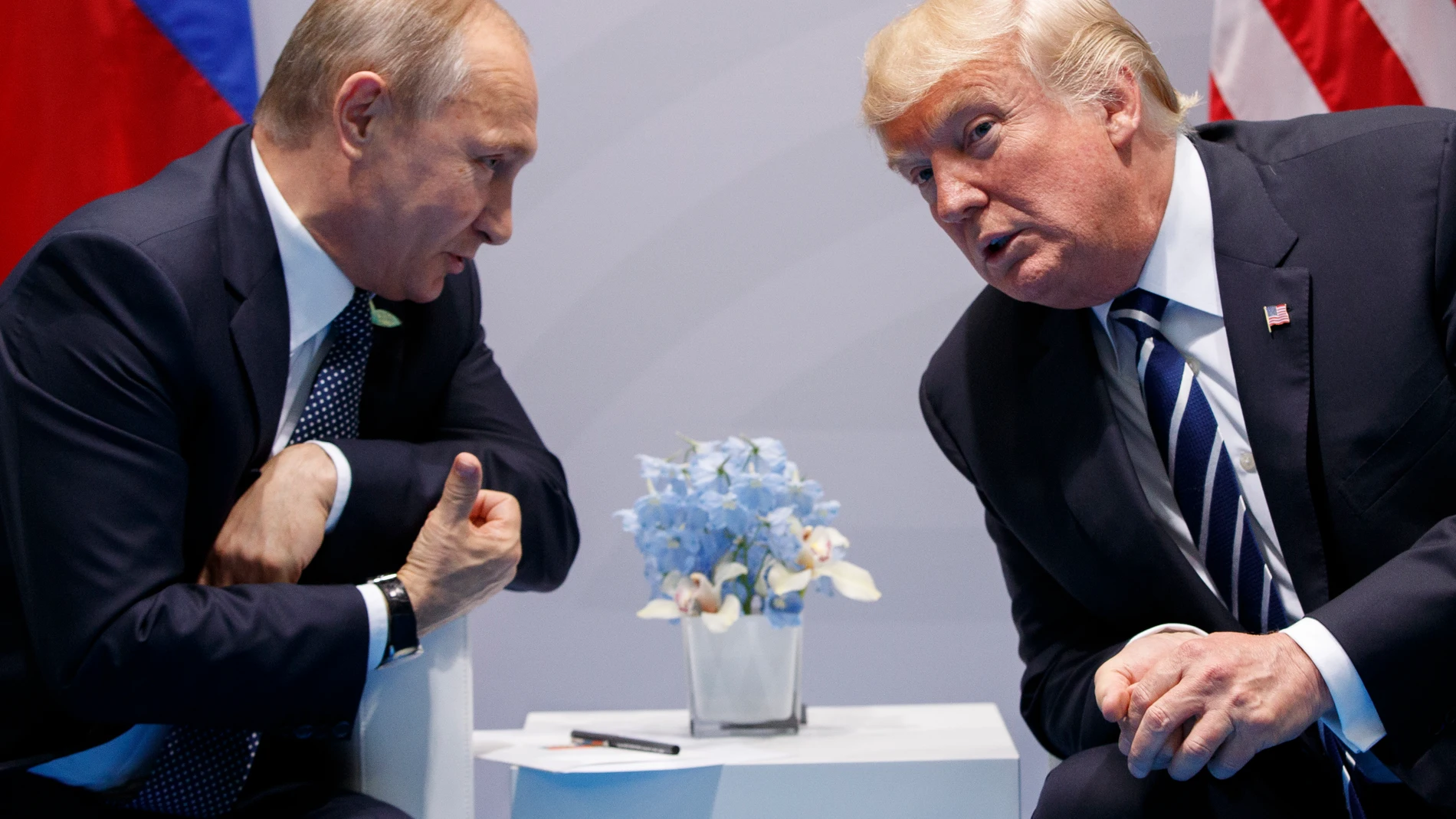 FILE - U.S. President Donald Trump meets with Russian President Vladimir Putin at the G-20 Summit on July 7, 2017, in Hamburg, Germany. (AP Photo/Evan Vucci, File)