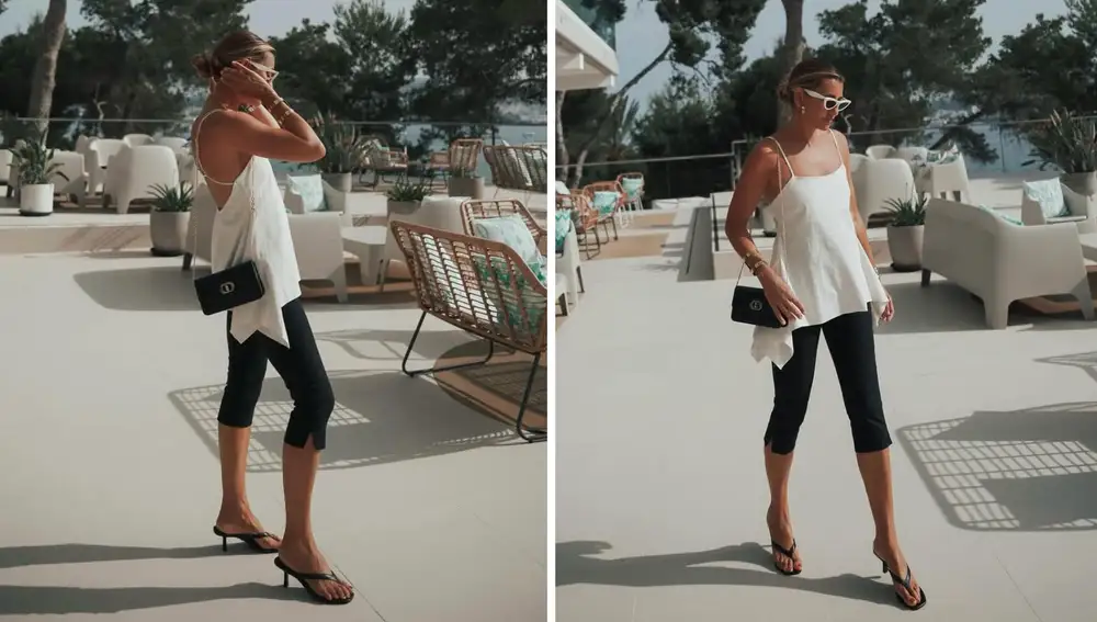 Pantalón capri negro con top fluido de tirantes y flip flop de tacón bajo.