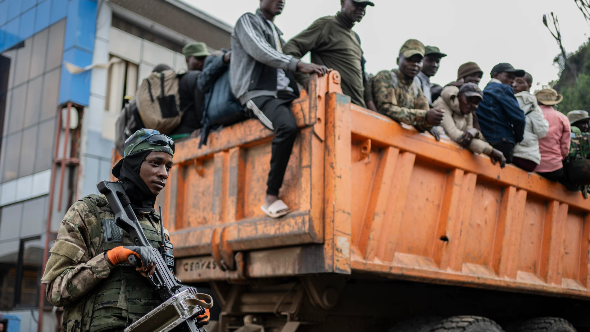 FILE - Former members of the Armed Forces of the Democratic Republic of Congo (FARDC) and police officers who allegedly surrendered to M23 rebels arrive in Goma, Congo, Sunday, Feb. 23, 2025. (AP Photo/Moses Sawasawa, file)