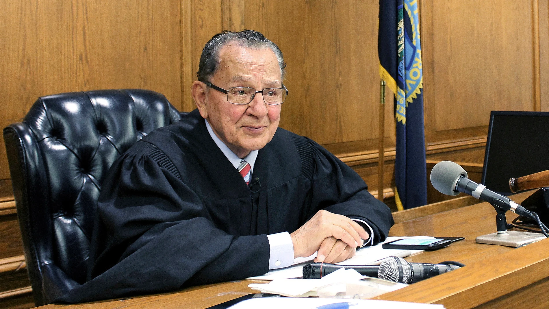 FILE - Providence Municipal Court Judge Frank Caprio sits on the bench in Providence, R.I., Aug. 10, 2017. (AP Photo/Michelle R. Smith, File)