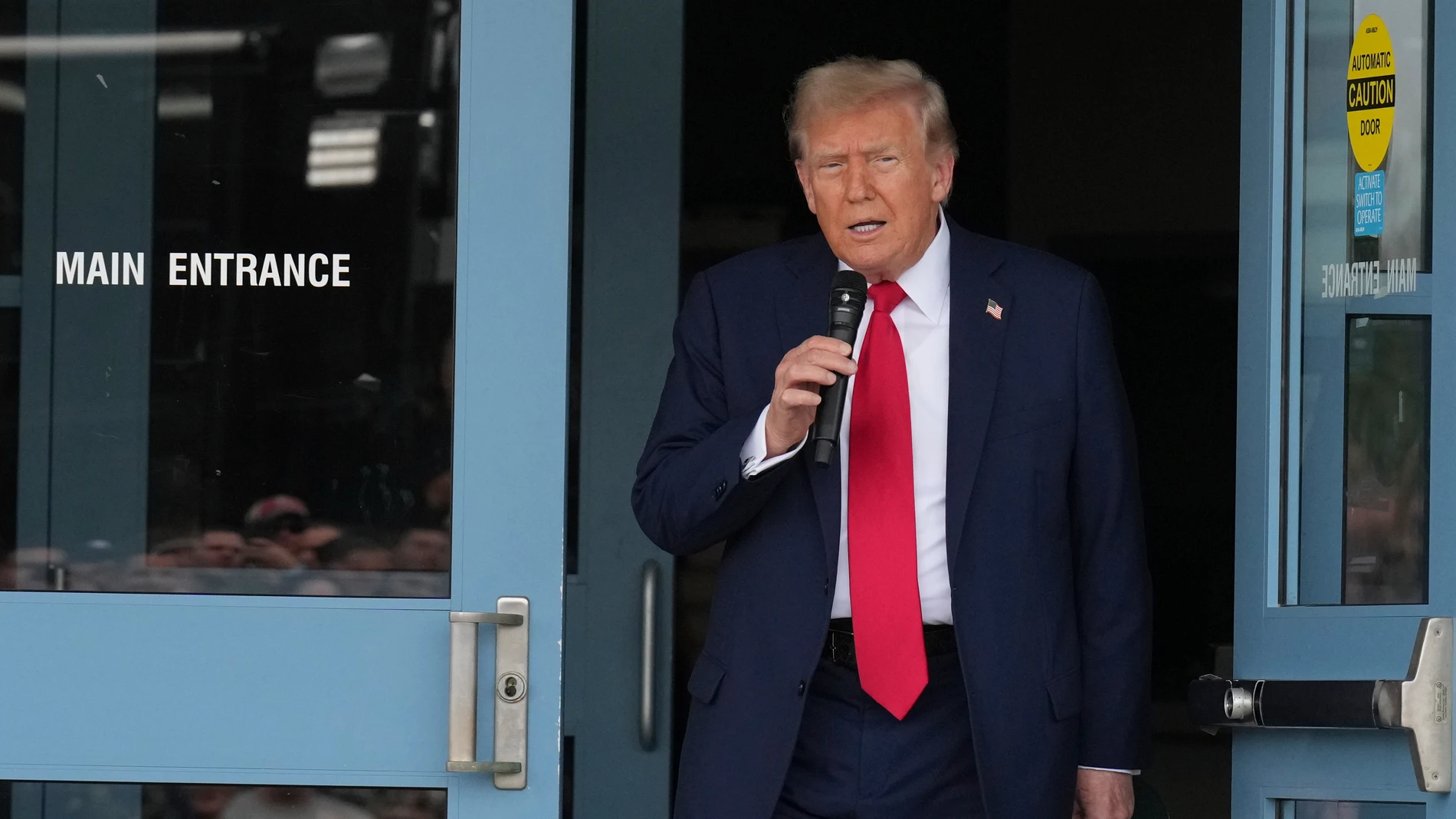 President Donald Trump speaks with members of law enforcement and National Guard soldiers, Thursday, Aug. 21, 2025, in Washington. (AP Photo/Jacquelyn Martin)