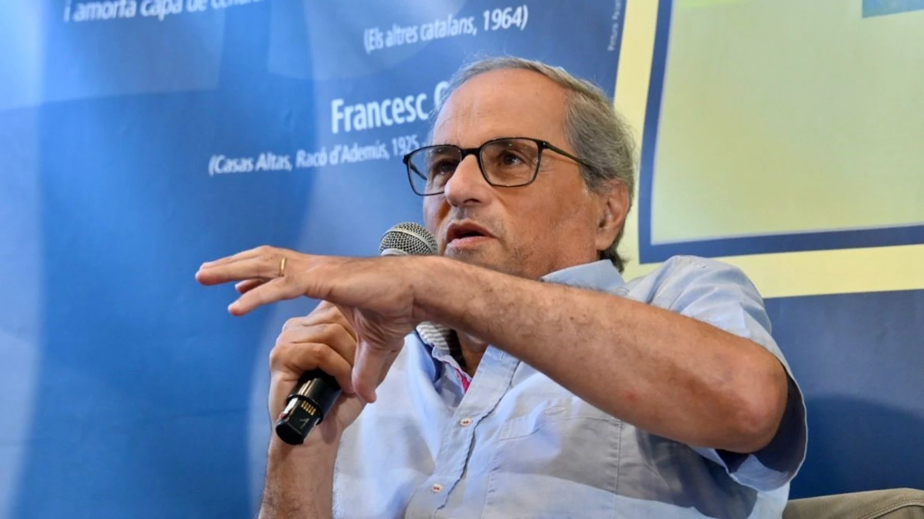 El expresidente de la Generalitat Quim Torra en una mesa redonda en la Universitat Catalana d'Estiu (UCE) REMITIDA / HANDOUT por JOSEP MARIA MONTANER-UNIVERSITAT CATALANA D'ESTIU Fotografía remitida a medios de comunicación exclusivamente para ilustrar la noticia a la que hace referencia la imagen, y citando la procedencia de la imagen en la firma 22/08/2025