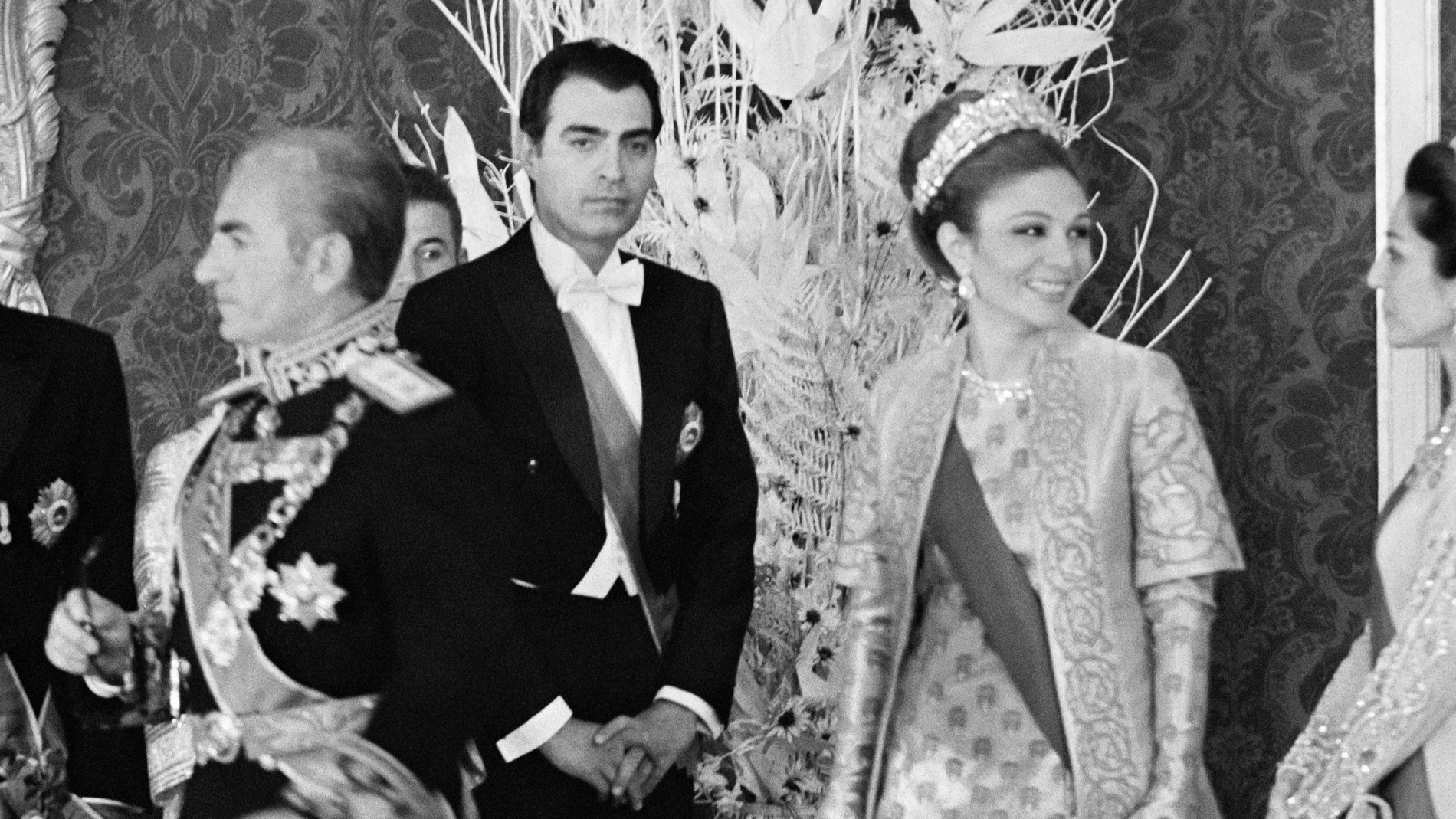 Shah of Iran Mohammad Reza Pahlavi (L) and Iranian Empress Farah Pahlavi arrive for a reception on the occasion of the 2500th anniversary of the Persian Empire in Persepolis on October 17, 1971.