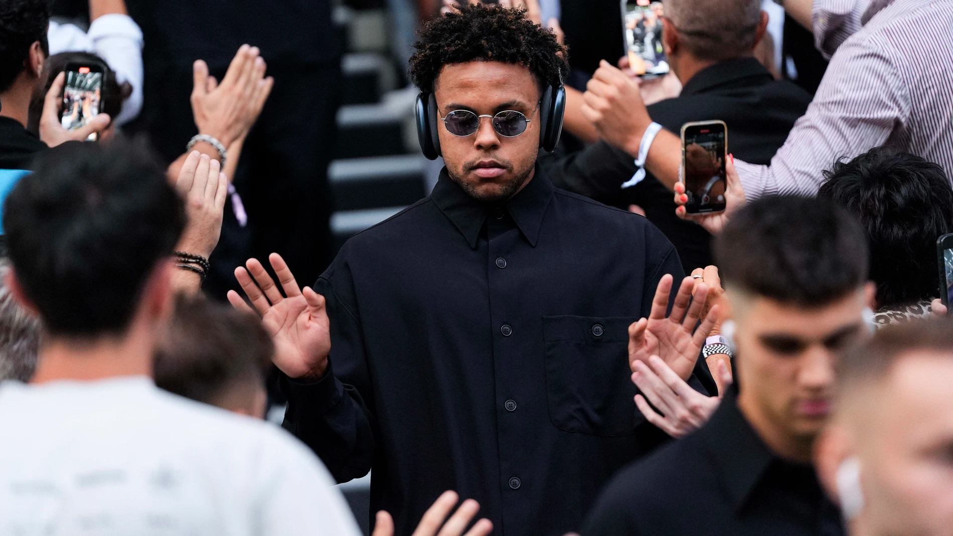 Juventus's Weston McKennie arrives before the start of a Serie A soccer match between Juventus and Parma at the Juventus Stadium in Turin, northern Italy, Sunday, Aug. 24, 2025. S(Fabio Ferrari/LaPresse via AP)