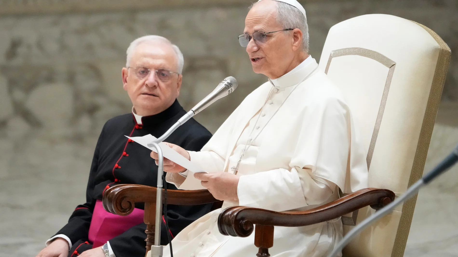 Pope Leo XIV reads his message during the weekly general audience at the Vatican, Wednesday, Aug. 27, 2025. (AP Photo/Gregorio Borgia)